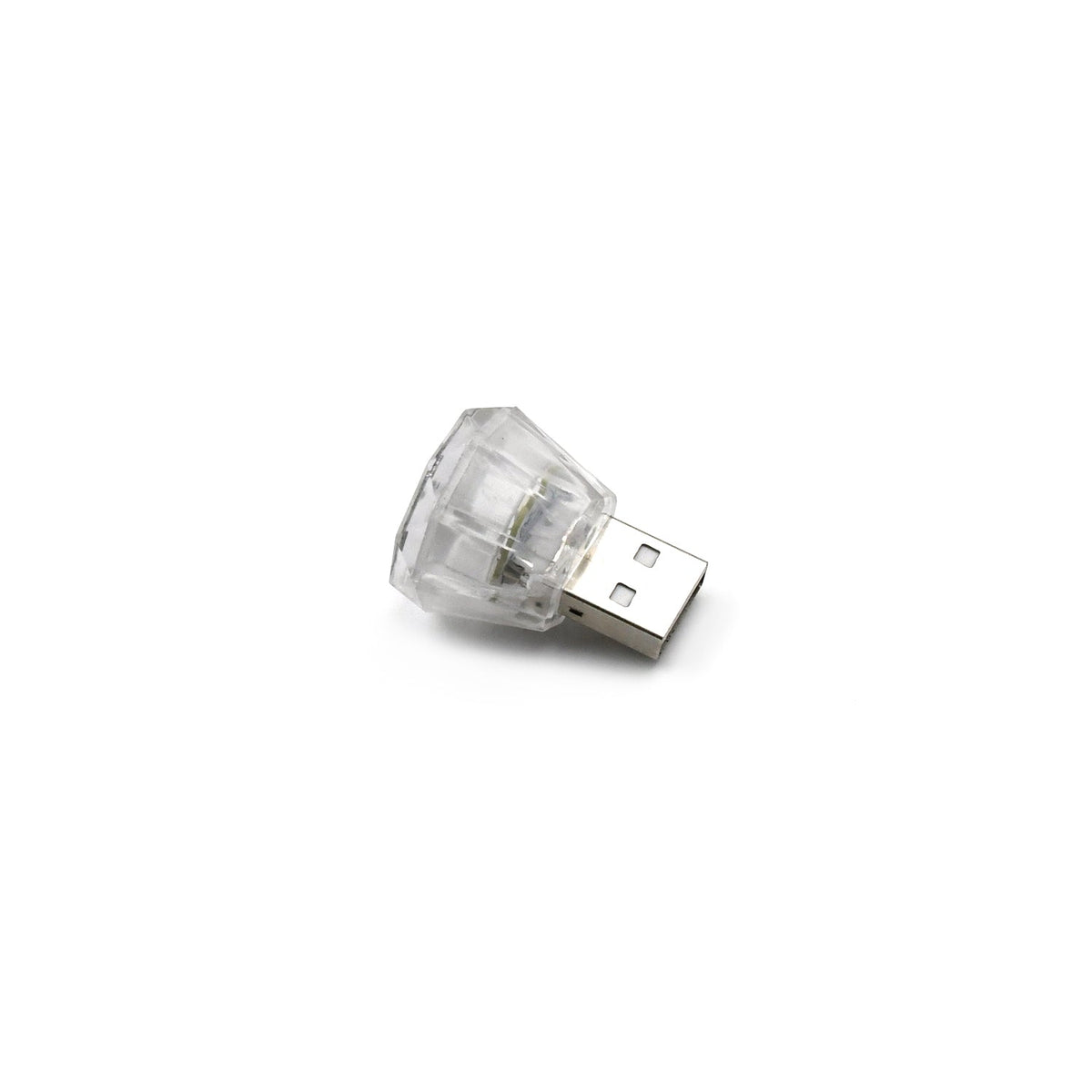 The compact diamond shape USB car interior light displayed on a flat surface.