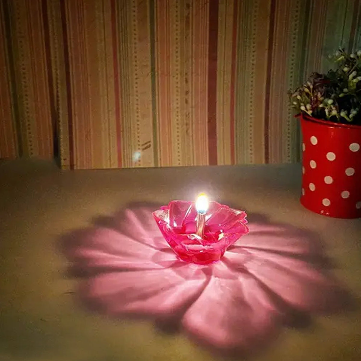 Overhead view of the Indo Glow Reflection Diya Set, highlighting its intricate patterns and colours.