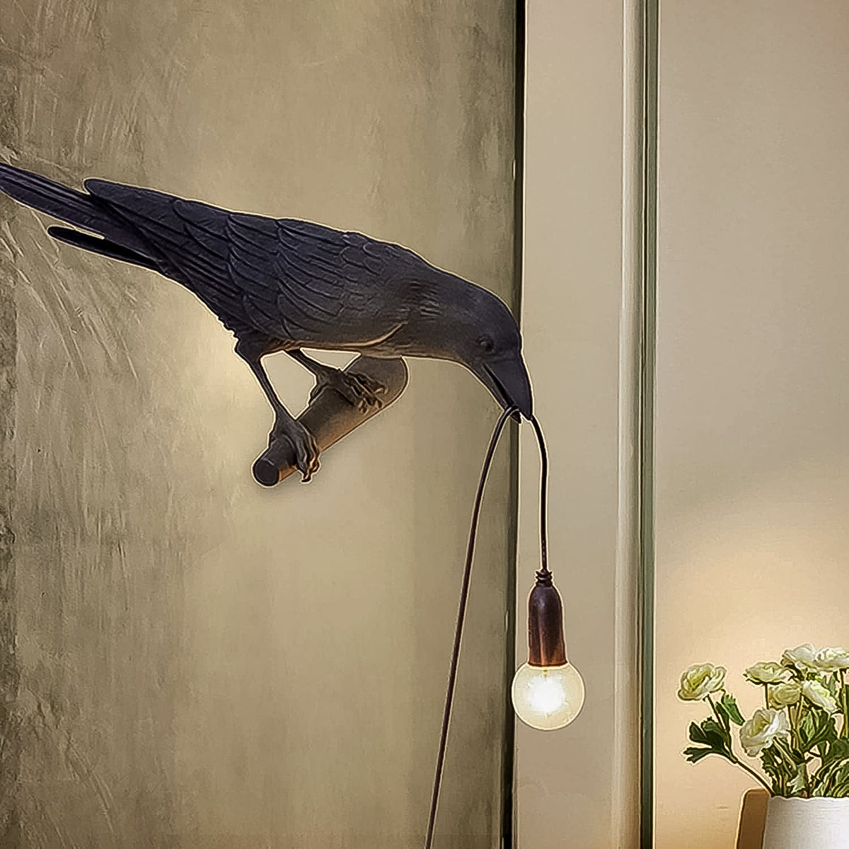 Modern crow table lamp illuminating a desk, showcasing its unique aesthetic.