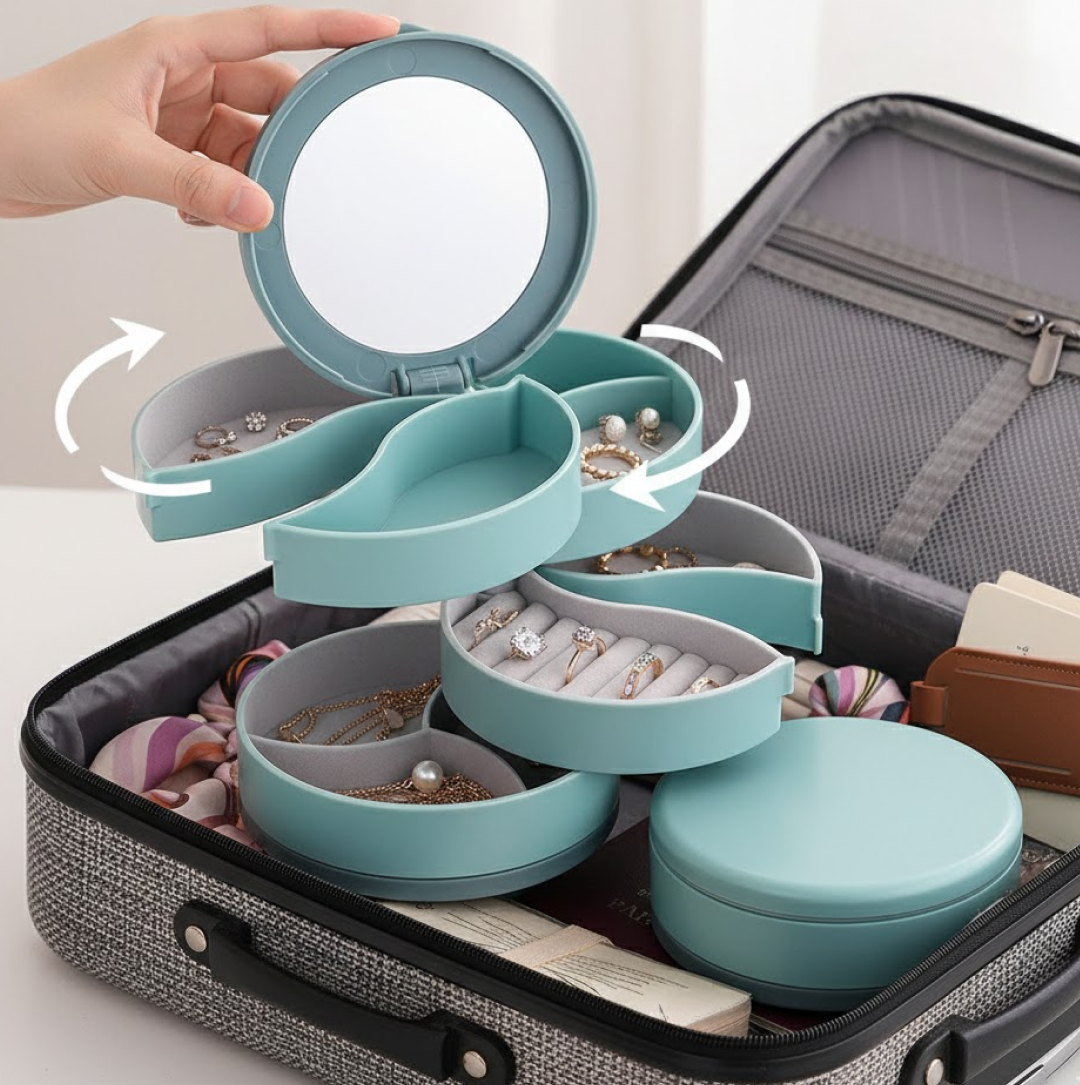 Stylish rotating jewellery organizer box with four tiers and built-in mirror.