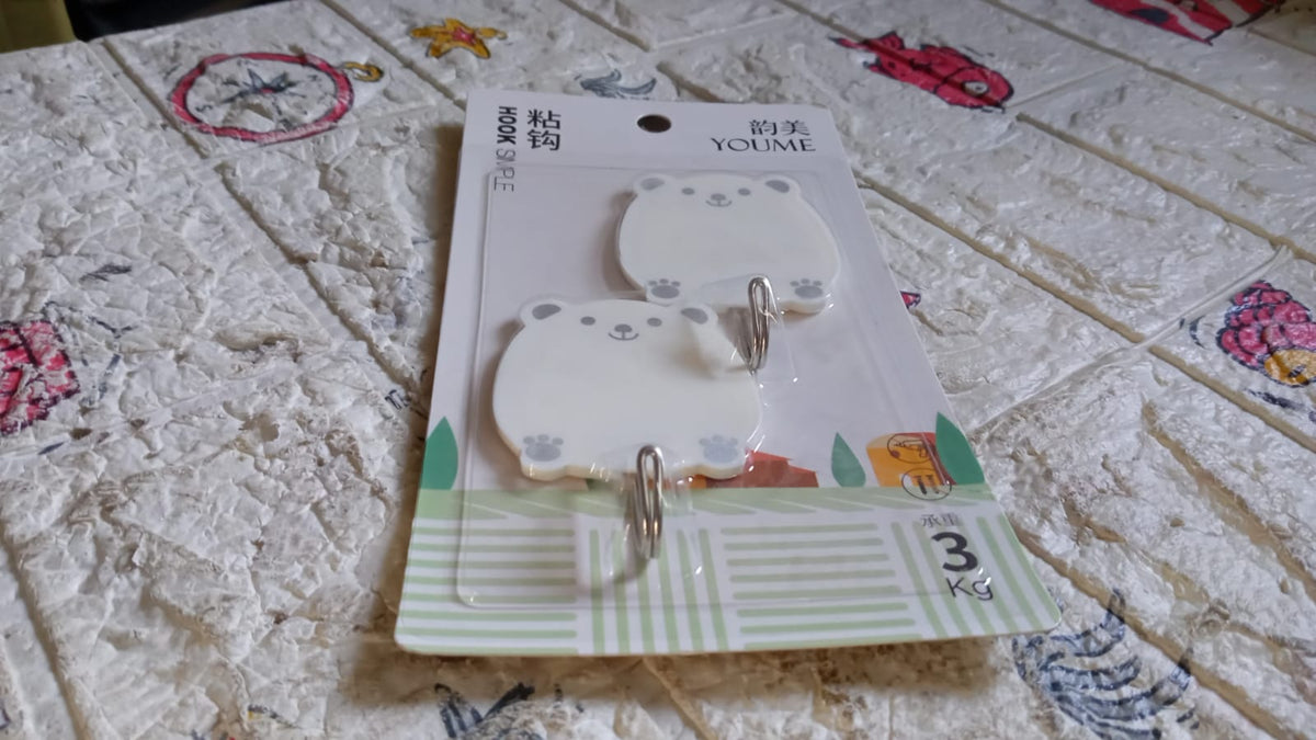 Set of two multi-purpose hanging hooks for easy installation without drilling.