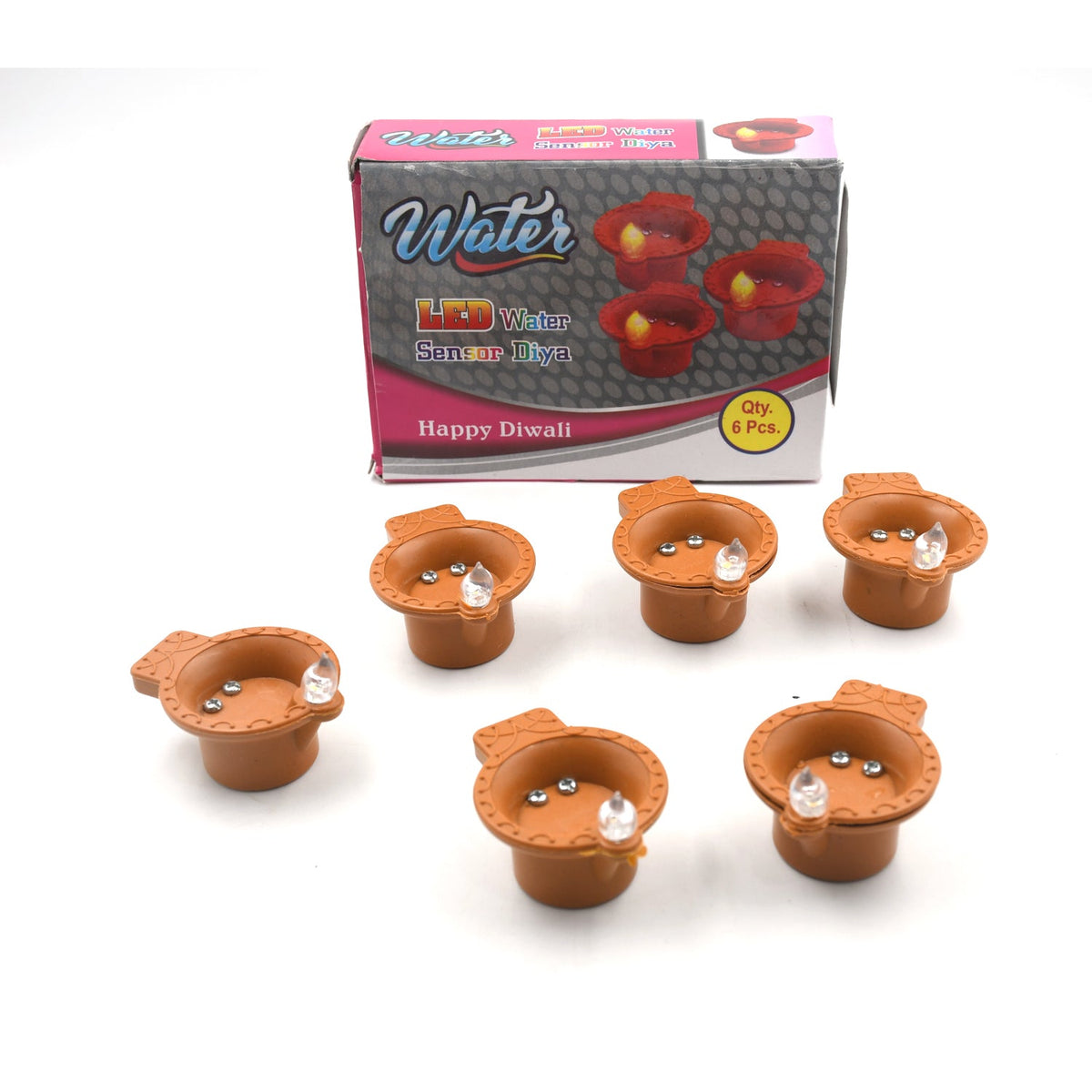 Flameless LED diyas creating a festive and safe ambiance on a decorated surface.