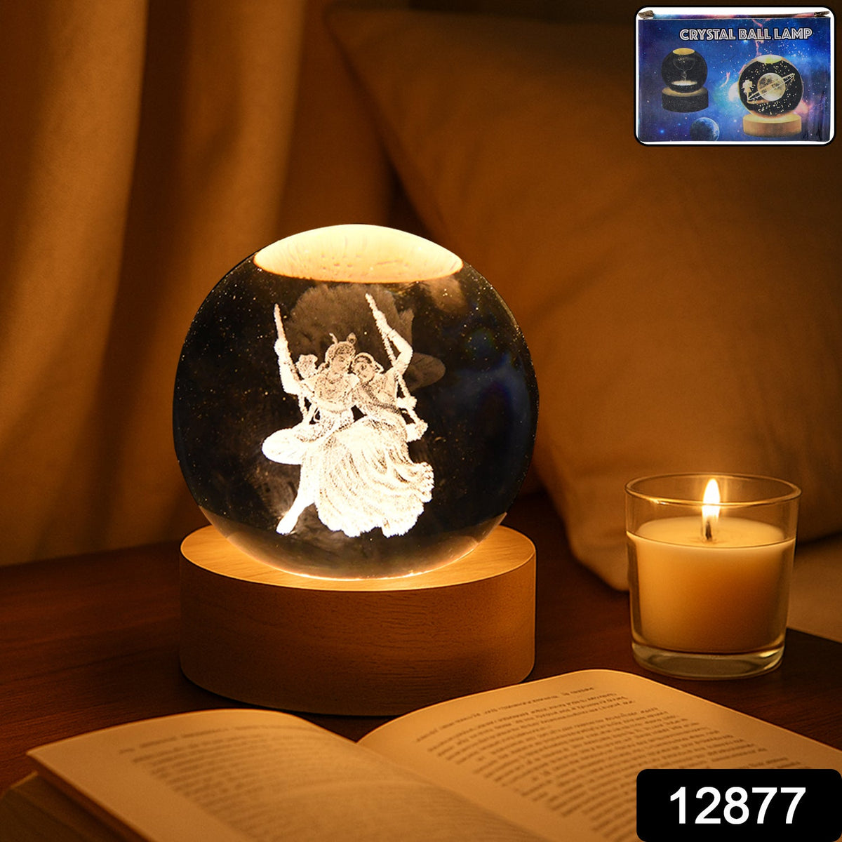 Close-up of the Radha Krishna idol inside the illuminated crystal ball.